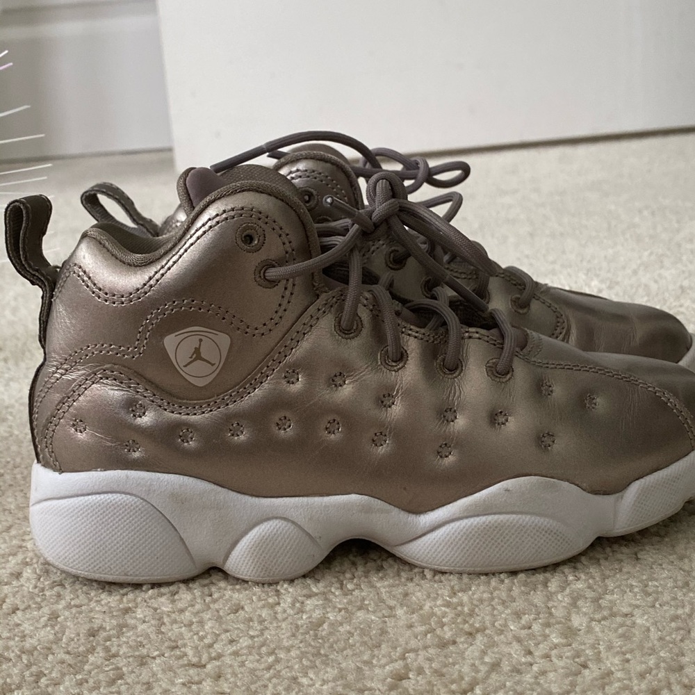 Size 13 gold Jordan’s